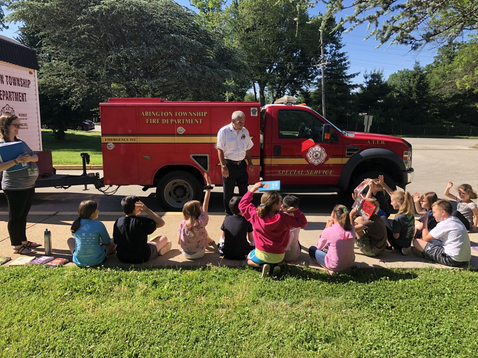 Fire Marshal teaching a third grade class about fire safety. 