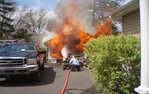 Fire Company suppressing a house fire. 