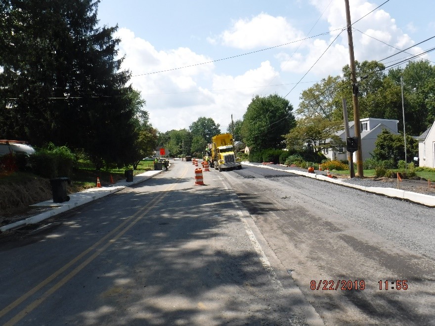 Asphalt paving on the north side of Tyson Ave.