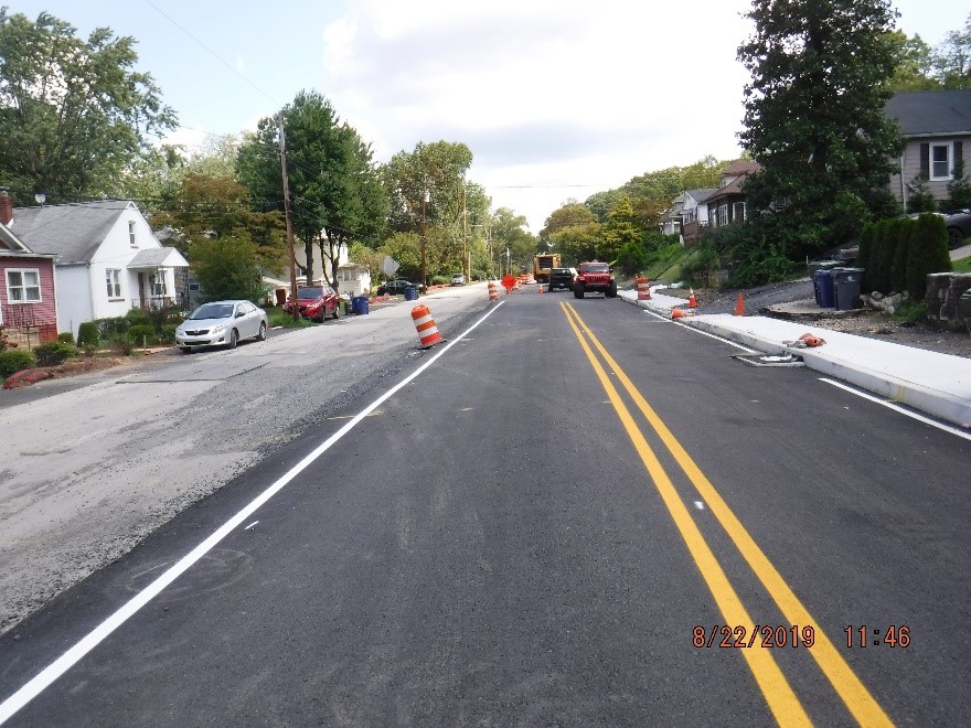 Asphalt paving on the south side of Tyson Ave.