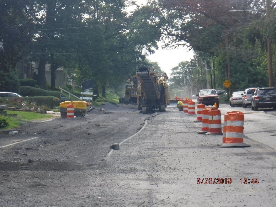 Milling of existing asphalt roadway on Tyson Ave.