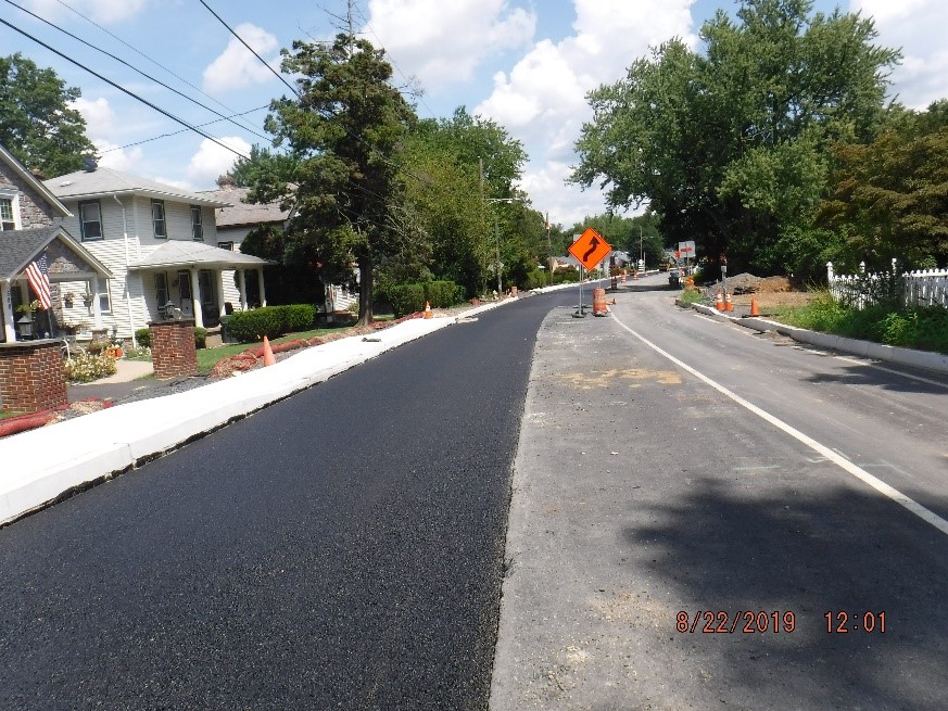 New asphalt pavement on the north side of Tyson Ave.