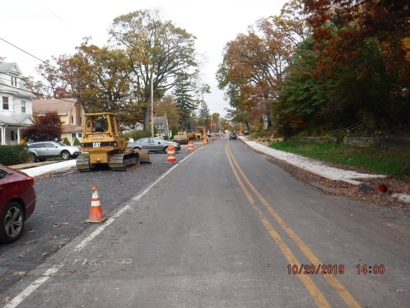 Asphalt pavement on Tyson Ave. east of Edgecomb Ave.