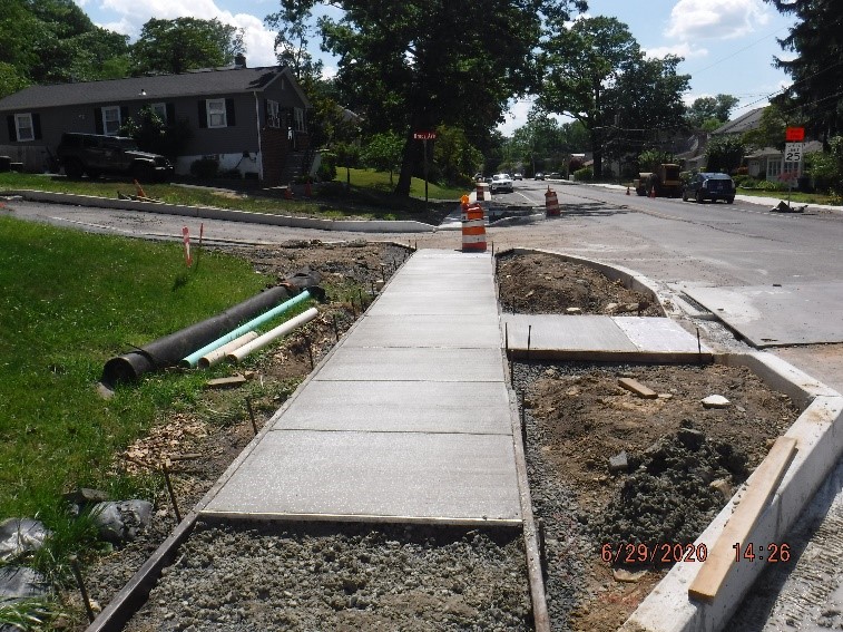 New sidewalk construction on Tyson Avenue at Bruce Road