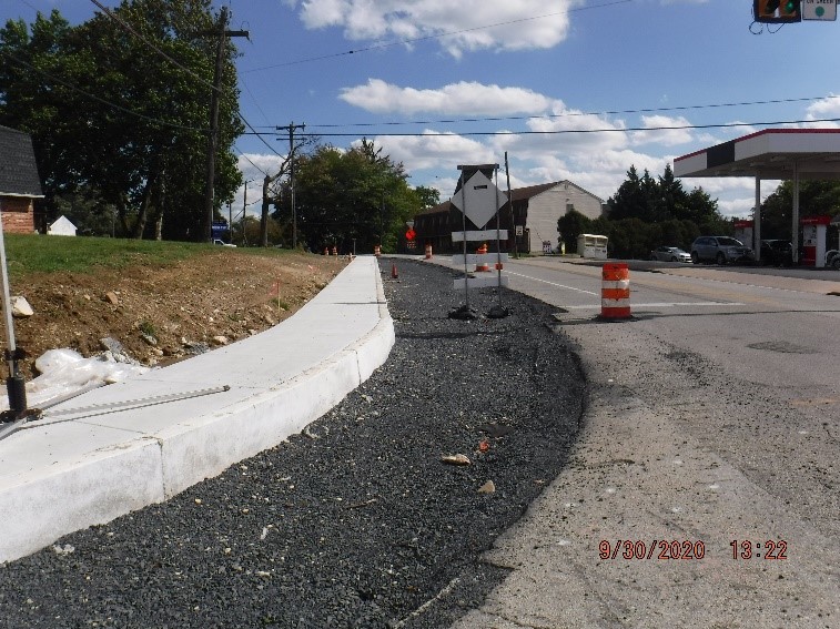 New roadway and curb construction on Jenkintown Road south of Tyson Ave.