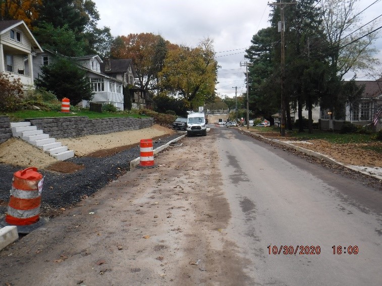 Edge Hill Road roadway construction and roadside development looking west towards Tyson Ave.