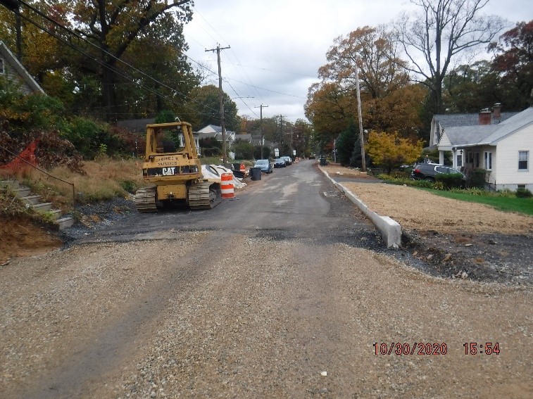 New roadway and curb construction on Edge Hill Road just west of Custer Ave.