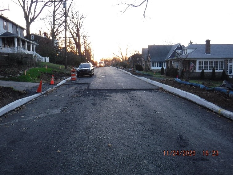 Roadway paving on Edge Hill Road between Custer Ave and Bradfield Road looking west